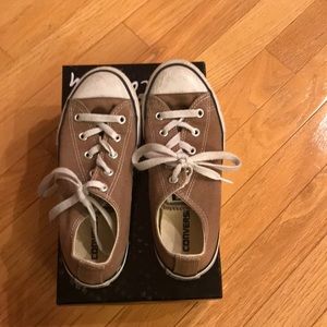 Brown low tops from Converse for boys and girls.